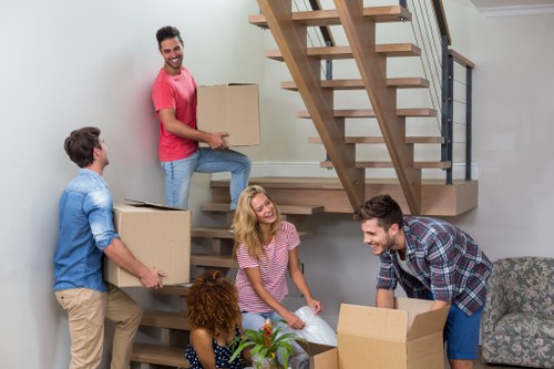 Office relocation planning in Pimlico with moving boxes and workspace setup