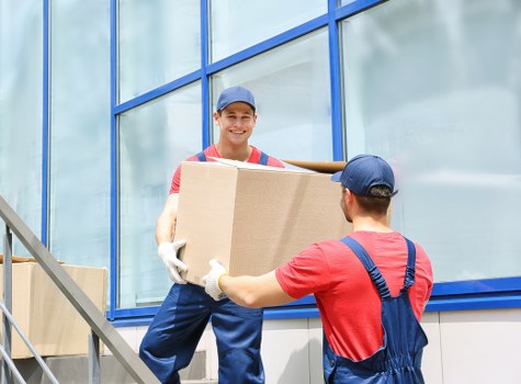 Removal team handling belongings during a Pimlico move